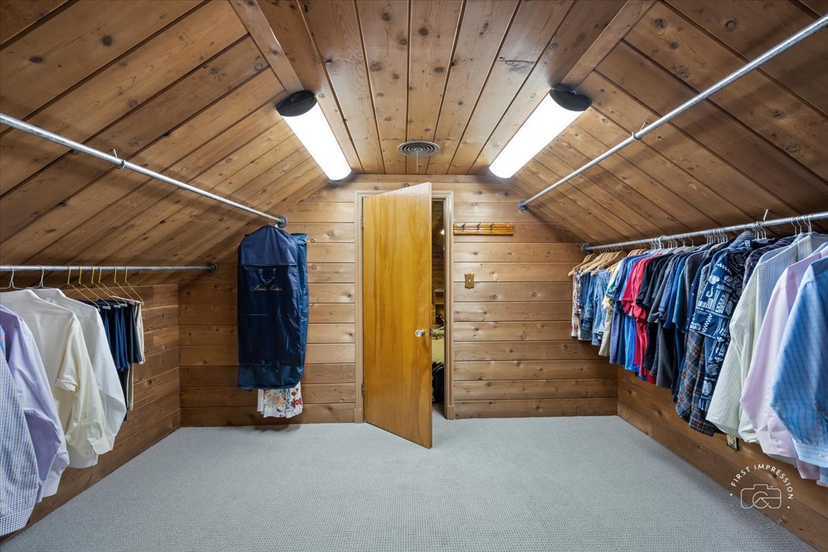 27158 West Cuba Road Barrington, IL 60010 - Photo 33 of 51 a view of walk in closet with clothes