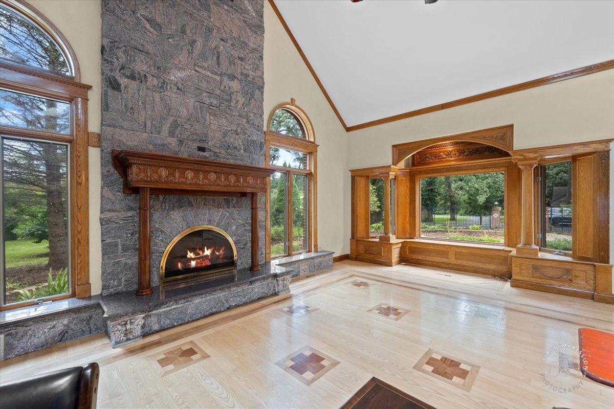 27158 West Cuba Road Barrington, IL 60010 - Photo 36 of 51 a living room with fireplace and a large window