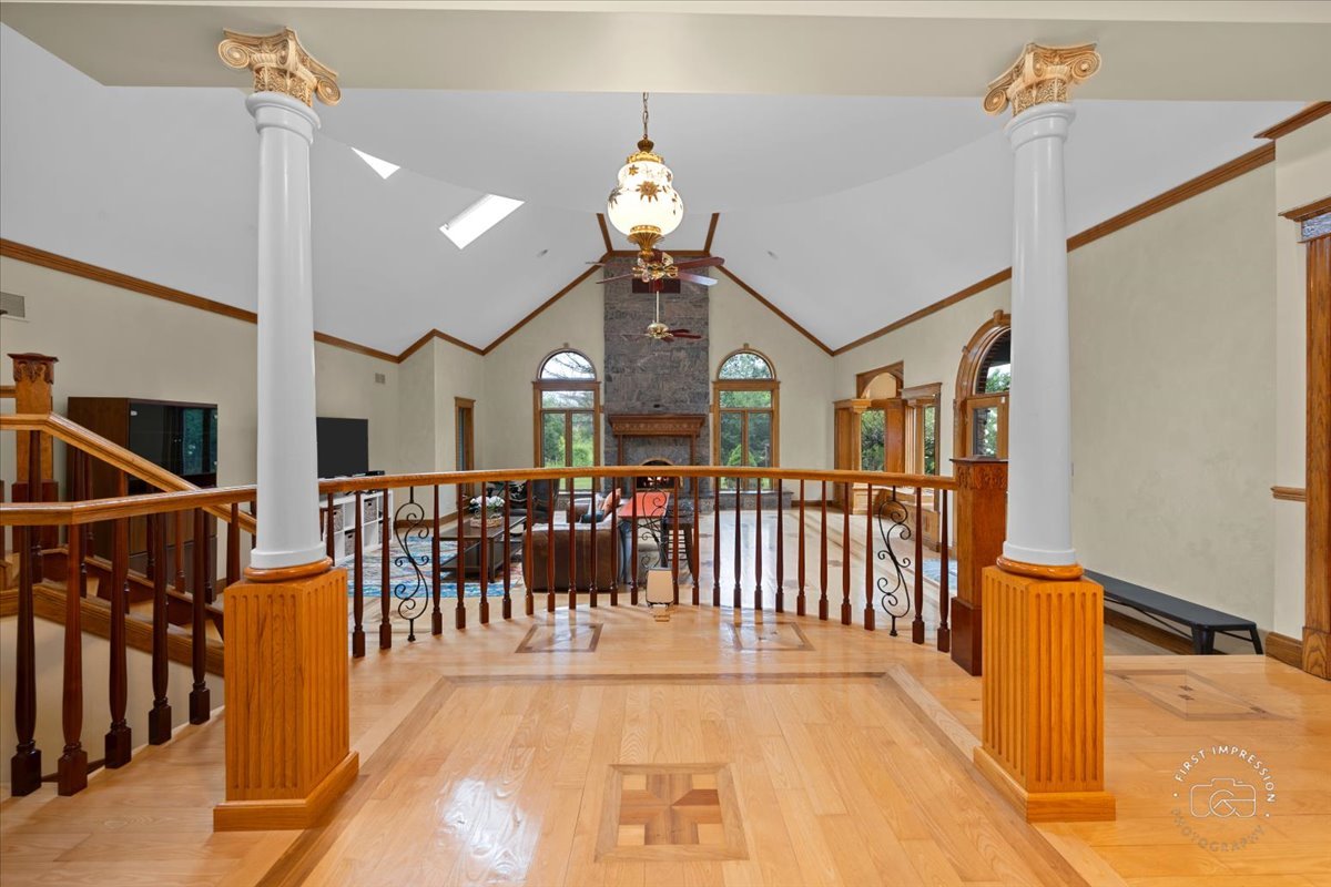 27158 West Cuba Road Barrington, IL 60010 - Photo 39 of 51 a view of a hallway with wooden floor and windows