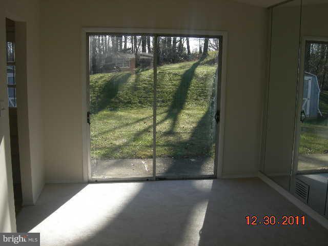 3317 Kenjac Road Windsor Mill, MD 21244 - Photo 2 of 12 a view of a glass door