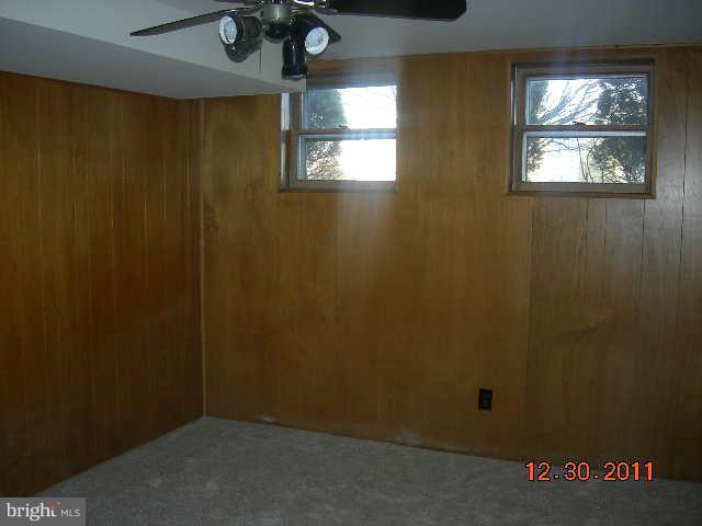 3317 Kenjac Road Windsor Mill, MD 21244 - Photo 4 of 12 an empty room with windows