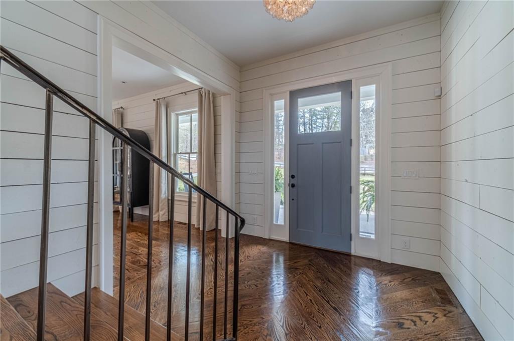 220 Audreys Way Suwanee, GA 30024 - Photo 11 of 66 a view of entryway with wooden floor