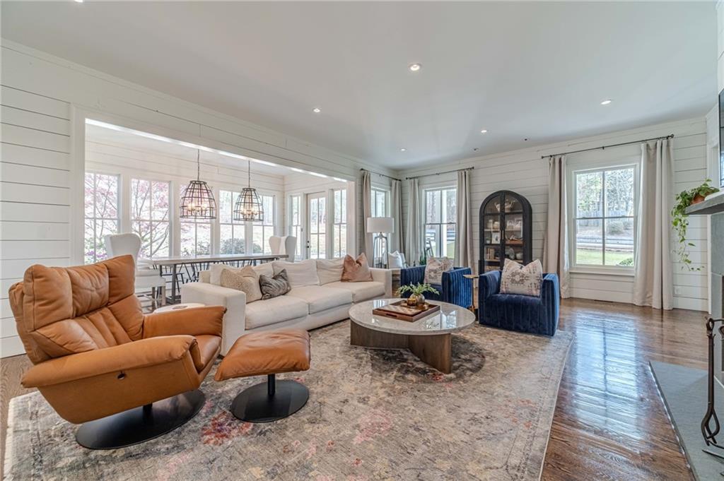 220 Audreys Way Suwanee, GA 30024 - Photo 13 of 66 a living room with furniture and a large window