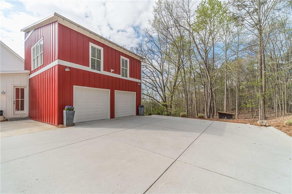220 Audreys Way Suwanee, GA 30024 - Photo 5 of 66 a view of a house with a yard