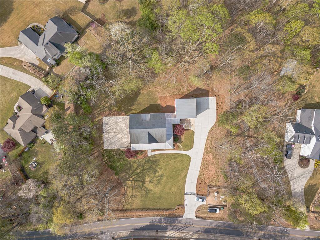 220 Audreys Way Suwanee, GA 30024 - Photo 55 of 66 an aerial view of a house with a yard