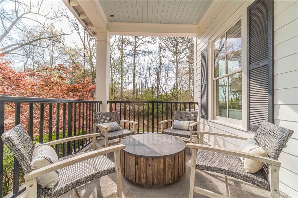 220 Audreys Way Suwanee, GA 30024 - Photo 6 of 66 a living room with furniture and a large window