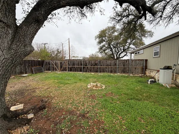 a view of a backyard with a garden