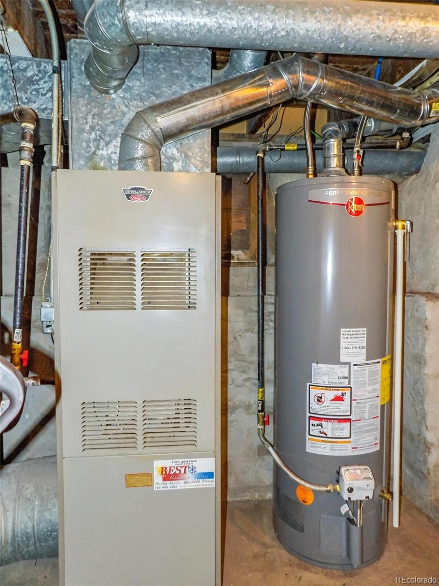 910 Elm Street Pueblo, CO 81004 - Photo 13 of 17 a utility room with dryer and washer