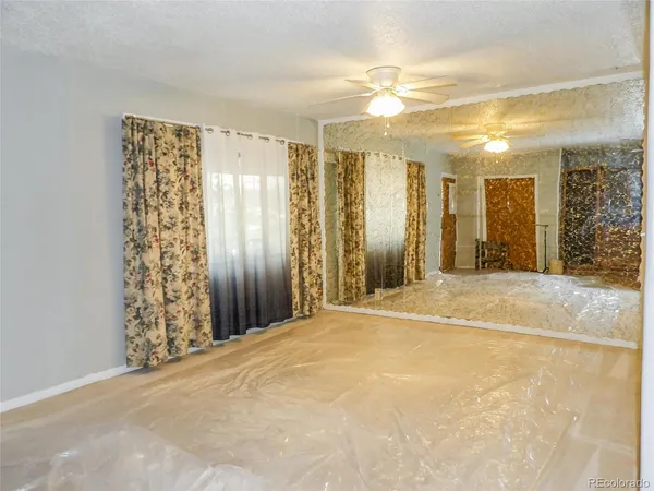 a view of a spacious bathroom with shower