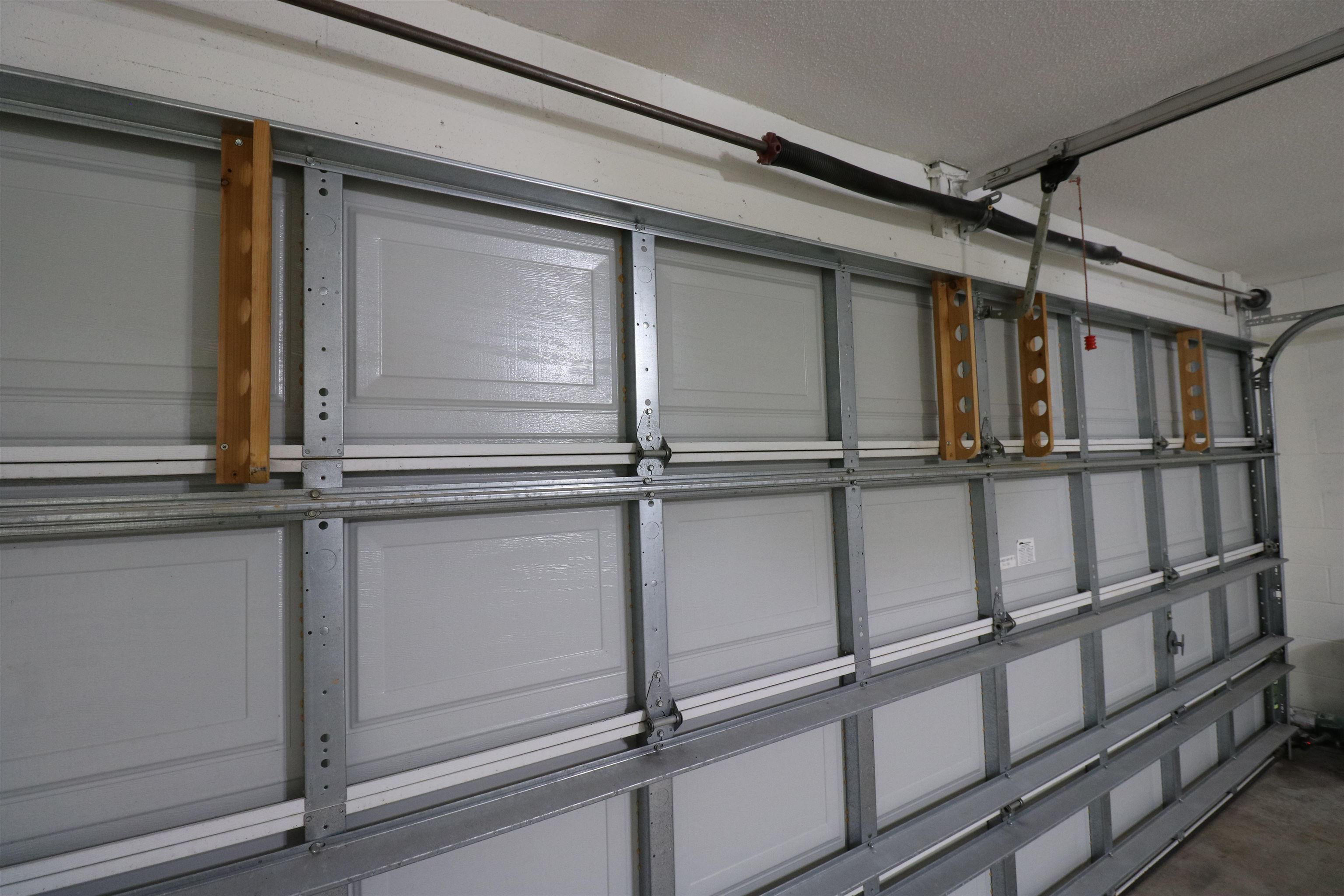 212 Merida Road St. Augustine, FL 32086 - Photo 23 of 32 There are custom built rod holders on the garage door