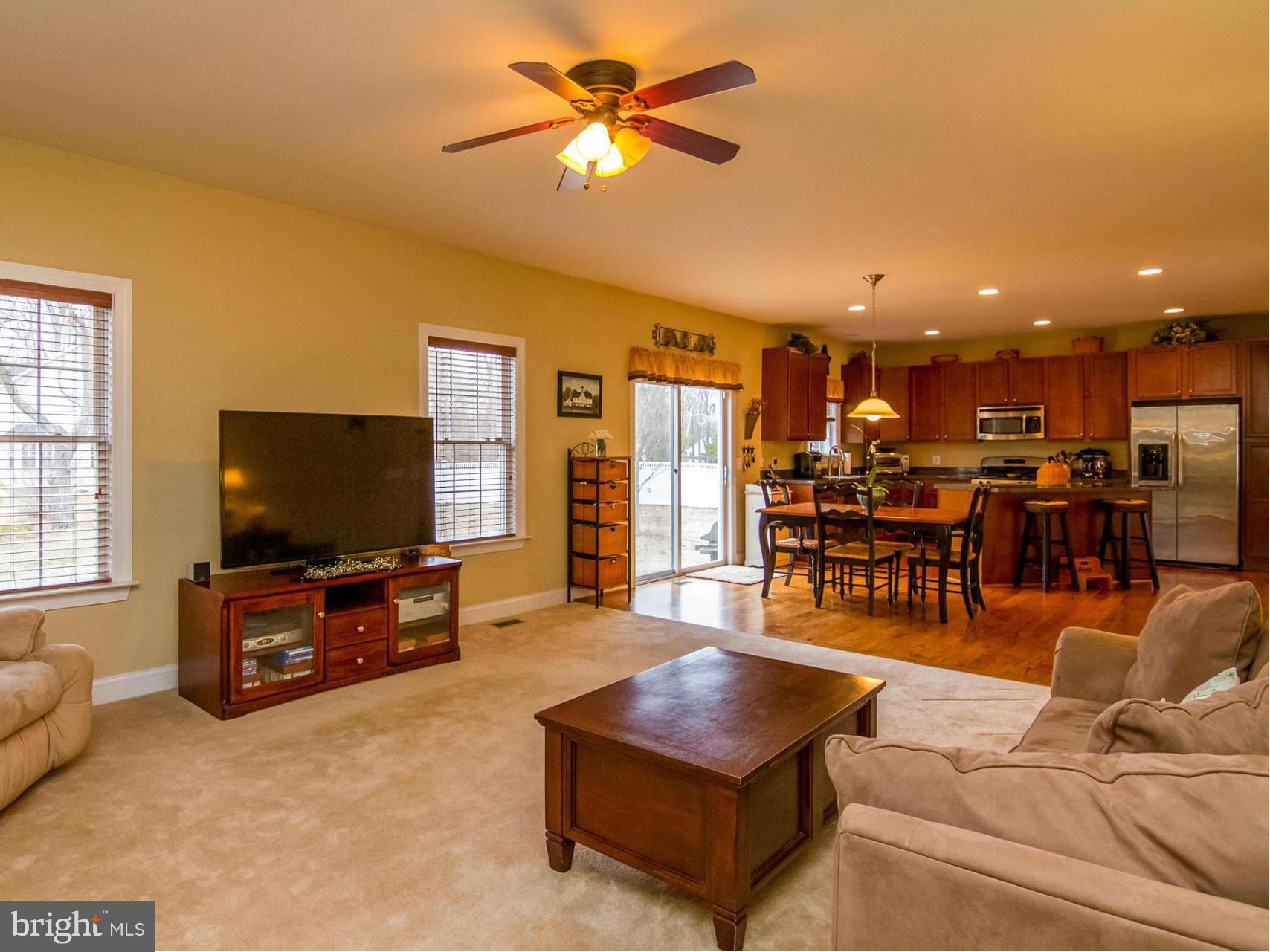 4021 Brummel Road Pasadena, MD 21122 - Photo 14 of 27 a living room with furniture and a flat screen tv