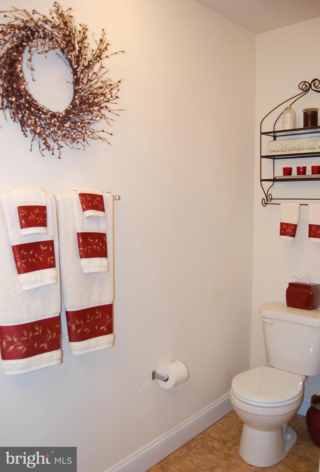 4021 Brummel Road Pasadena, MD 21122 - Photo 18 of 27 a bathroom with a toilet and a sink