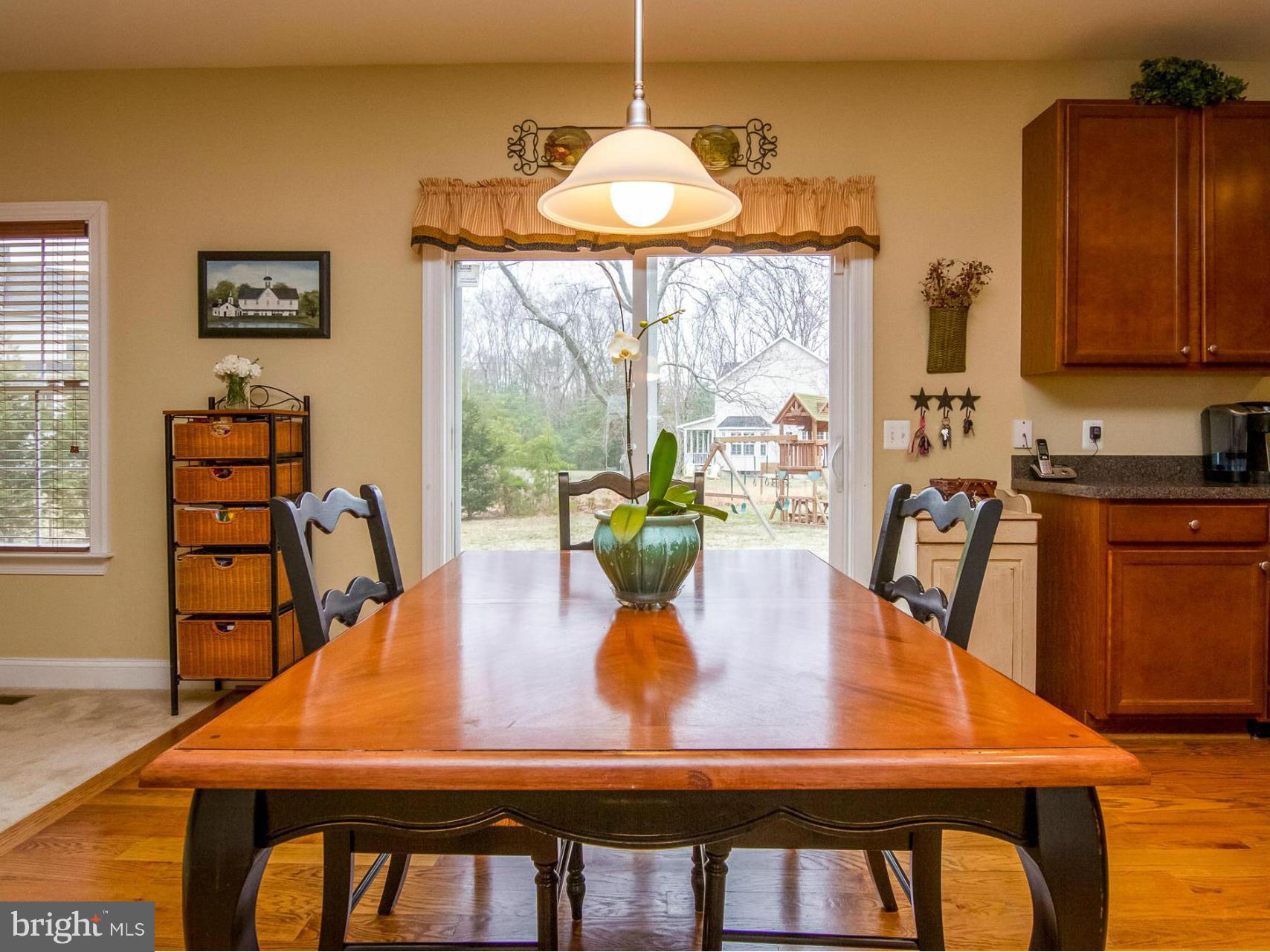 4021 Brummel Road Pasadena, MD 21122 - Photo 4 of 27 a view of a dining room with furniture and window