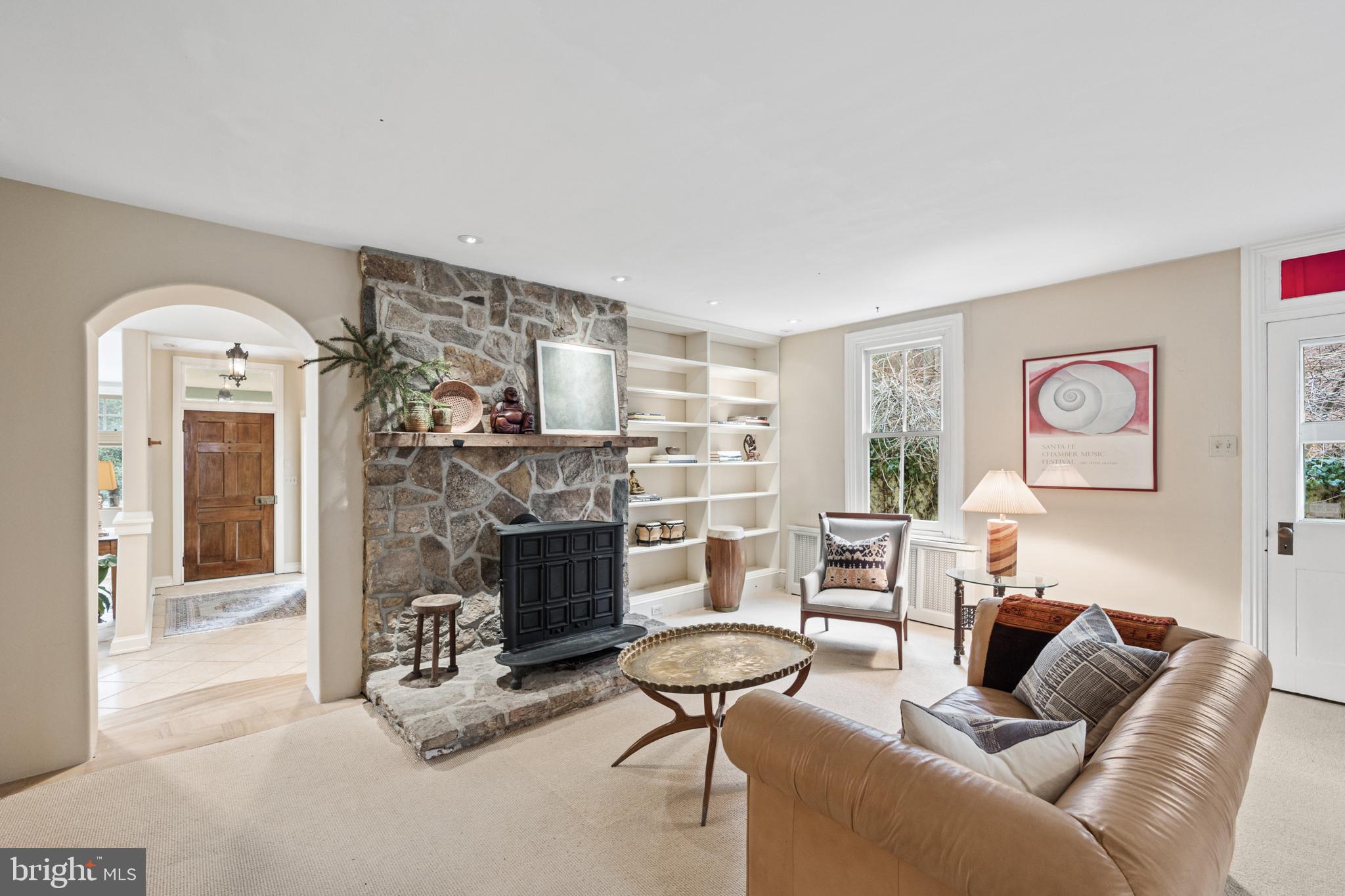4276 State Road Phoenixville, PA 19460 - Photo 23 of 56 Living room with arched entry from main entry hall