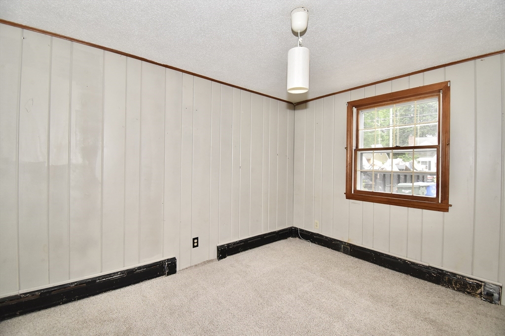 17 Old Brook Road Springfield, MA 01118 - Photo 16 of 23 a view of an empty room with a window