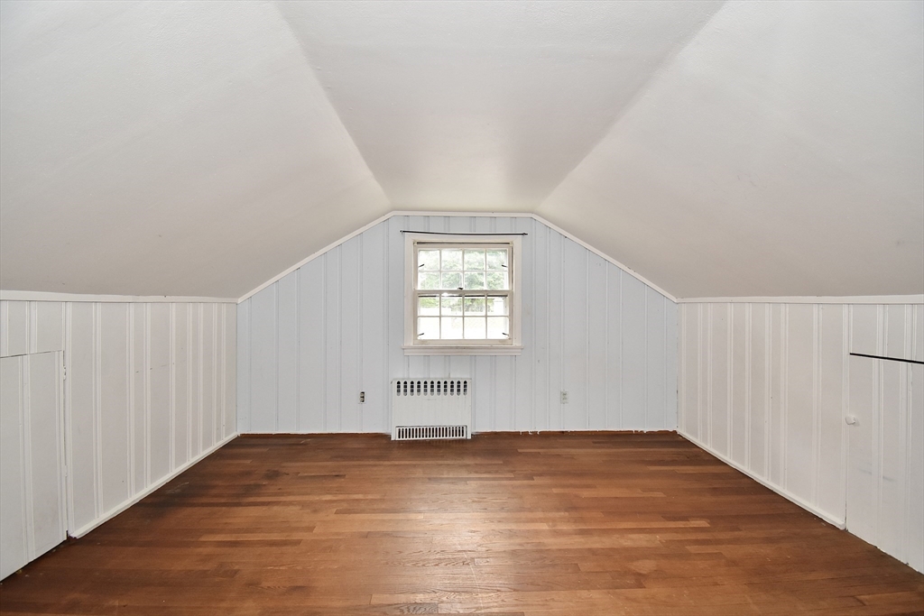 17 Old Brook Road Springfield, MA 01118 - Photo 17 of 23 an empty room with wooden floor and windows