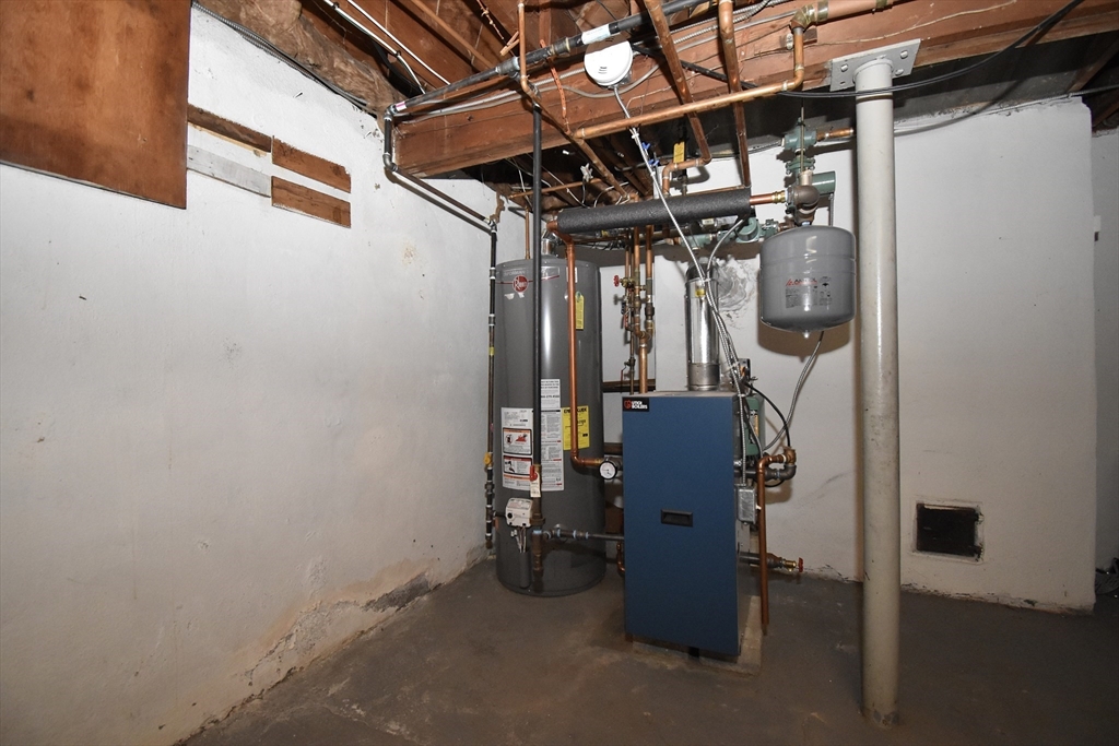17 Old Brook Road Springfield, MA 01118 - Photo 20 of 23 a view of a storage room with stairs