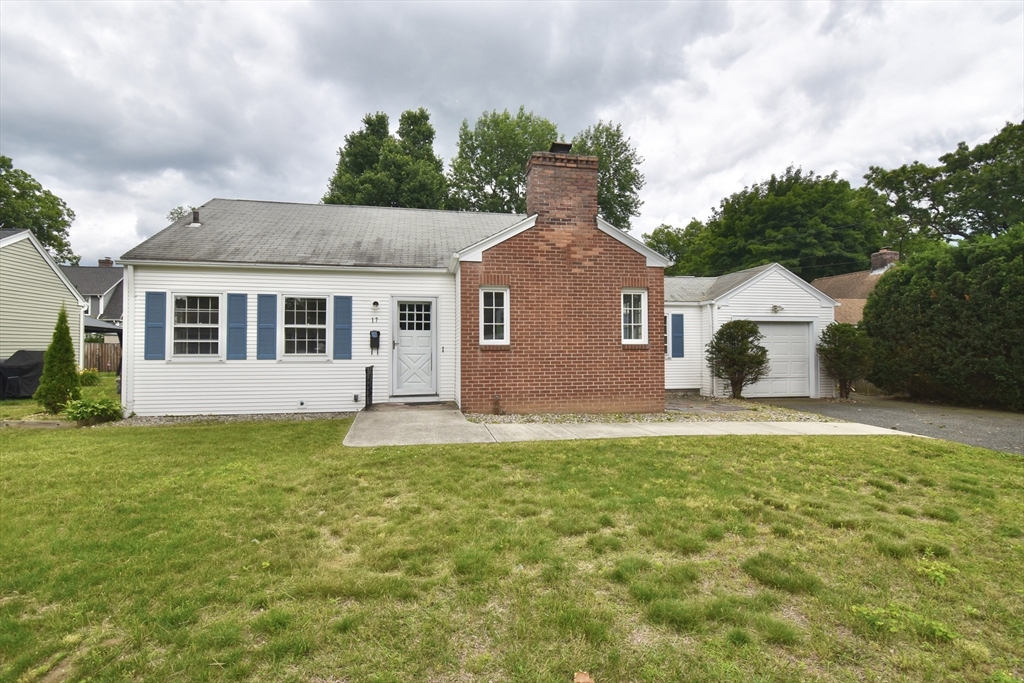 17 Old Brook Road Springfield, MA 01118 - Photo 2 of 23 a house view with a garden space