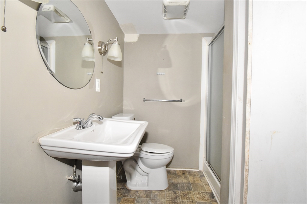17 Old Brook Road Springfield, MA 01118 - Photo 23 of 23 a bathroom with a sink toilet and a mirror