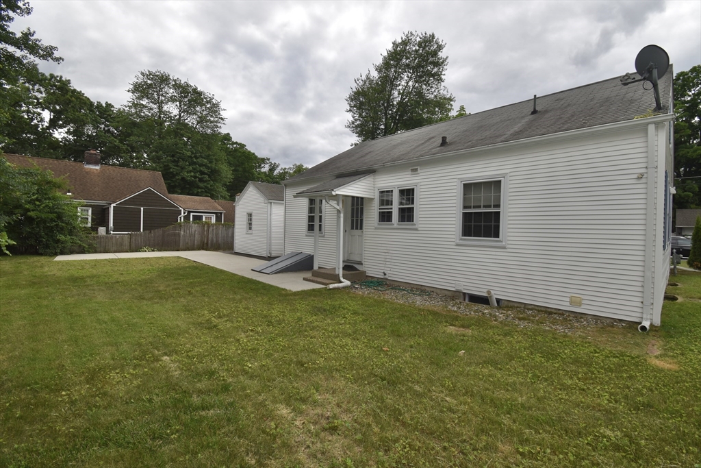 17 Old Brook Road Springfield, MA 01118 - Photo 6 of 23 a view of a white house with a yard