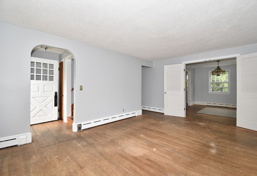 17 Old Brook Road Springfield, MA 01118 - Photo 10 of 23 an empty room with windows and closet