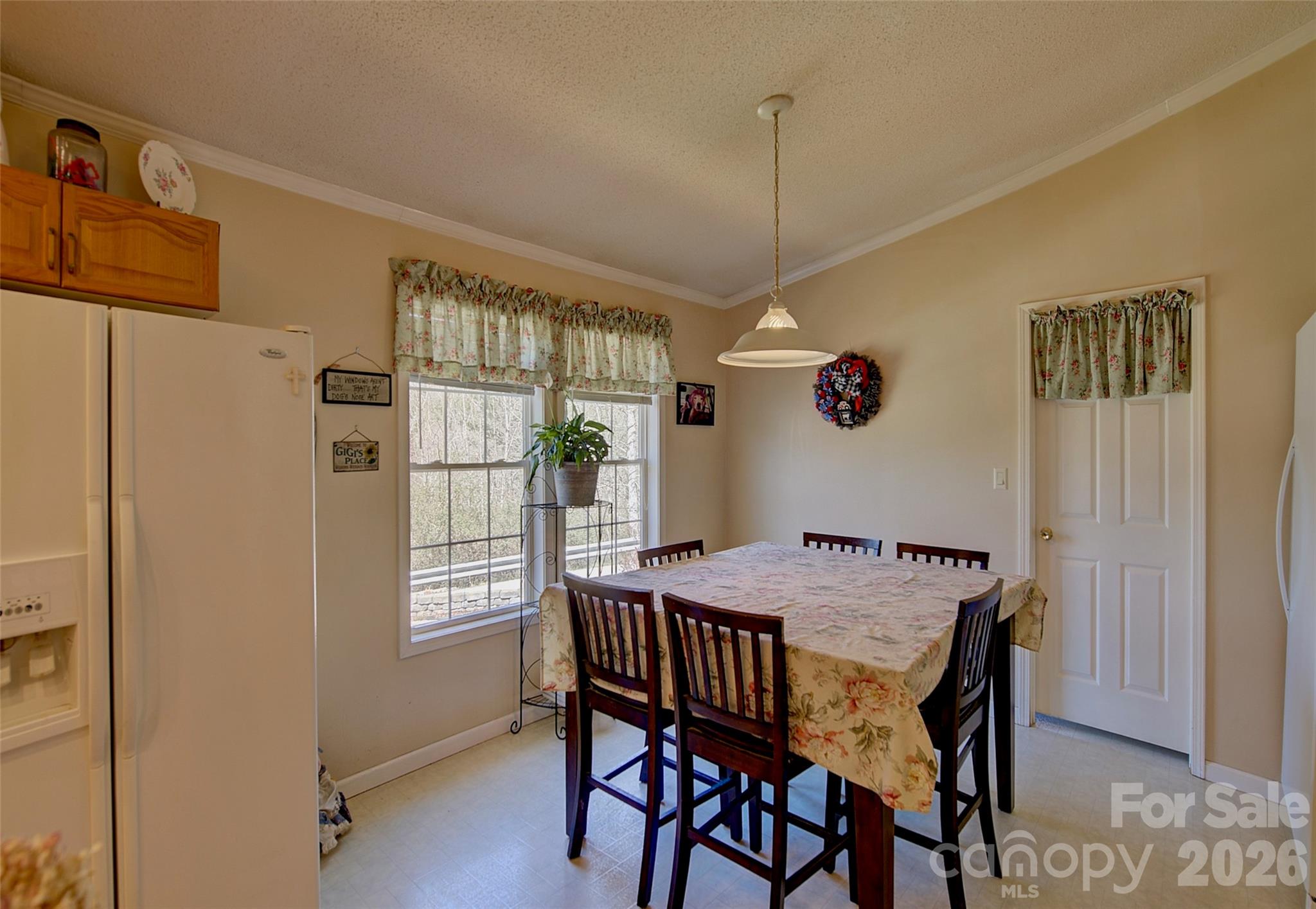 3 Altapass Trail Spruce Pine, NC 28777 - Photo 13 of 43 a view of a dining room with furniture window and wooden floor
