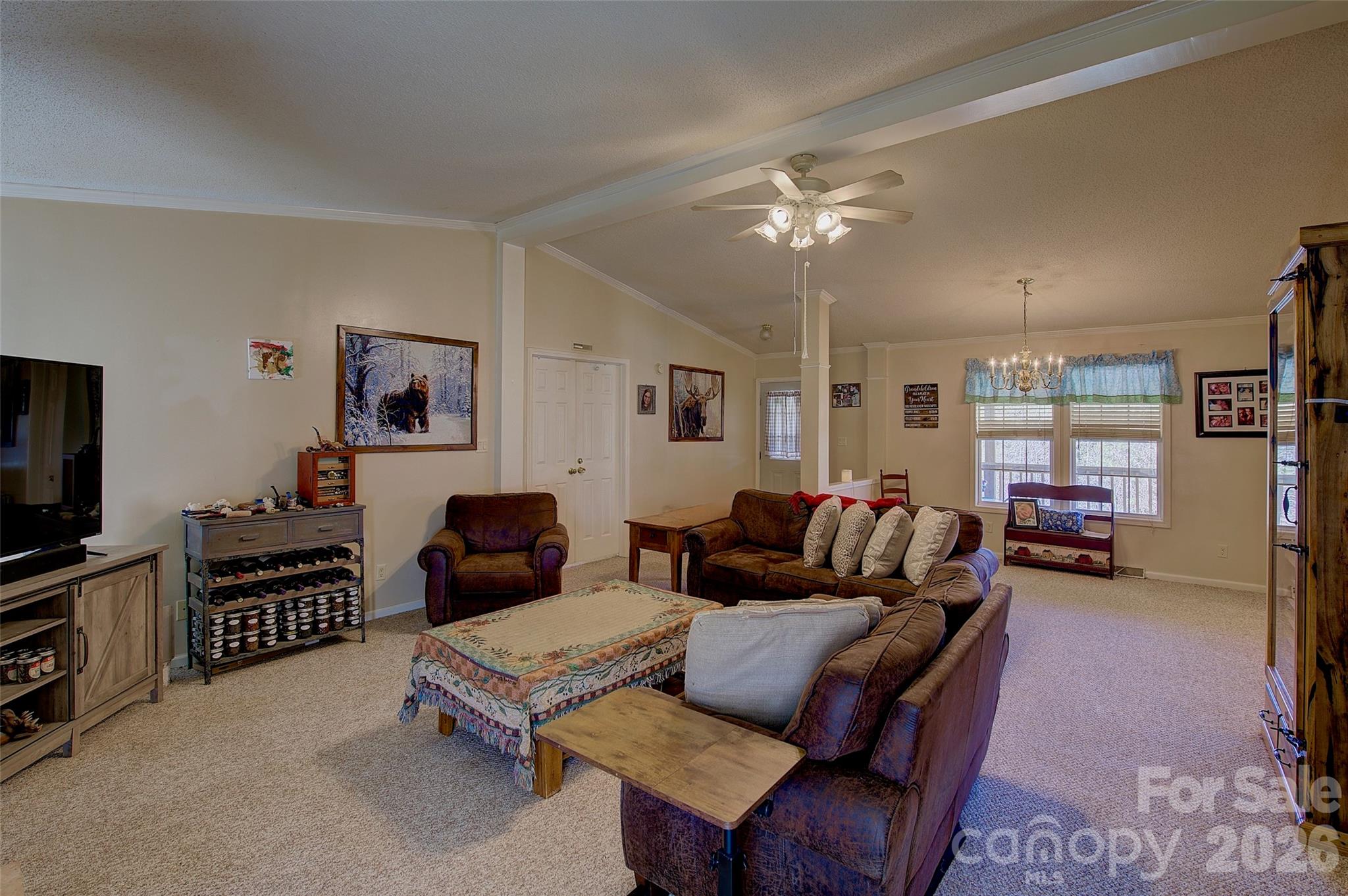 3 Altapass Trail Spruce Pine, NC 28777 - Photo 17 of 43 a living room with furniture a ceiling fan and a window