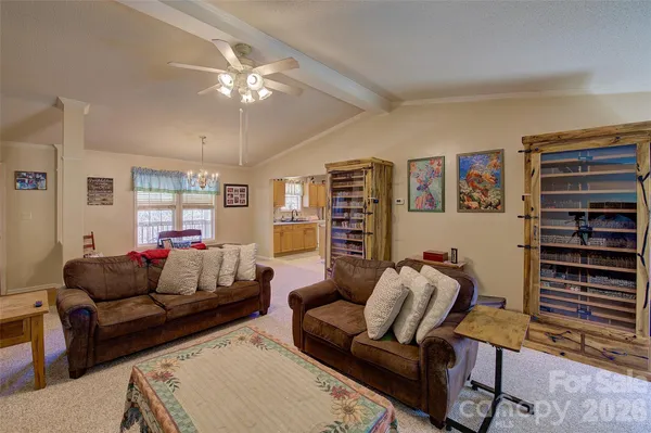 a bedroom with a bed and a television