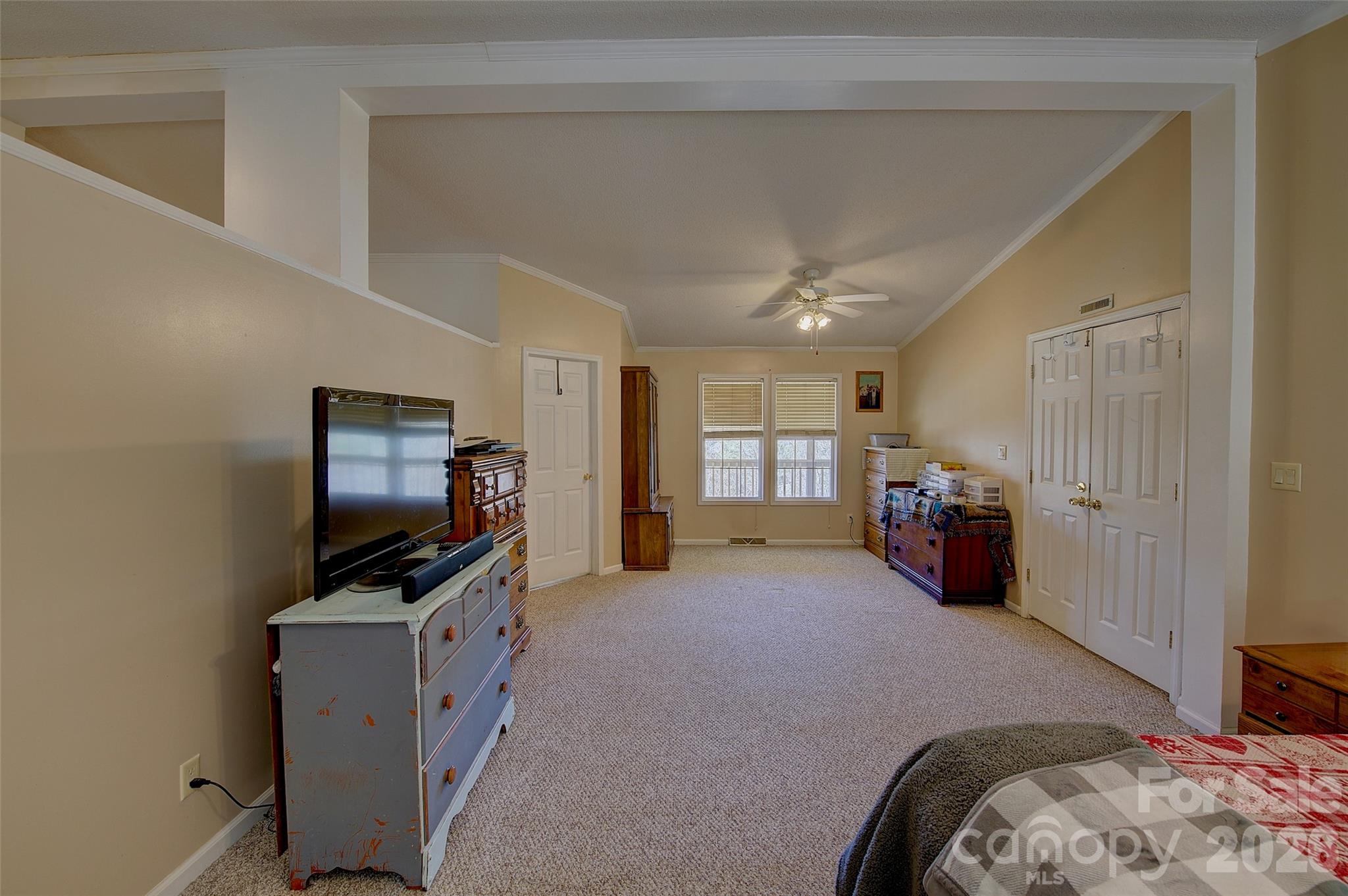 3 Altapass Trail Spruce Pine, NC 28777 - Photo 20 of 43 a bed room with furniture and a flat screen tv