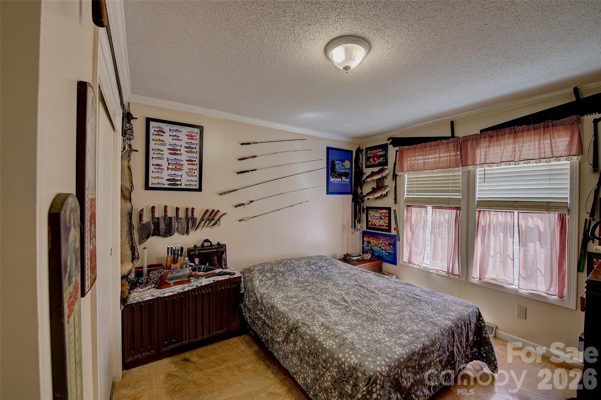 3 Altapass Trail Spruce Pine, NC 28777 - Photo 24 of 43 a bedroom with a bed and a window