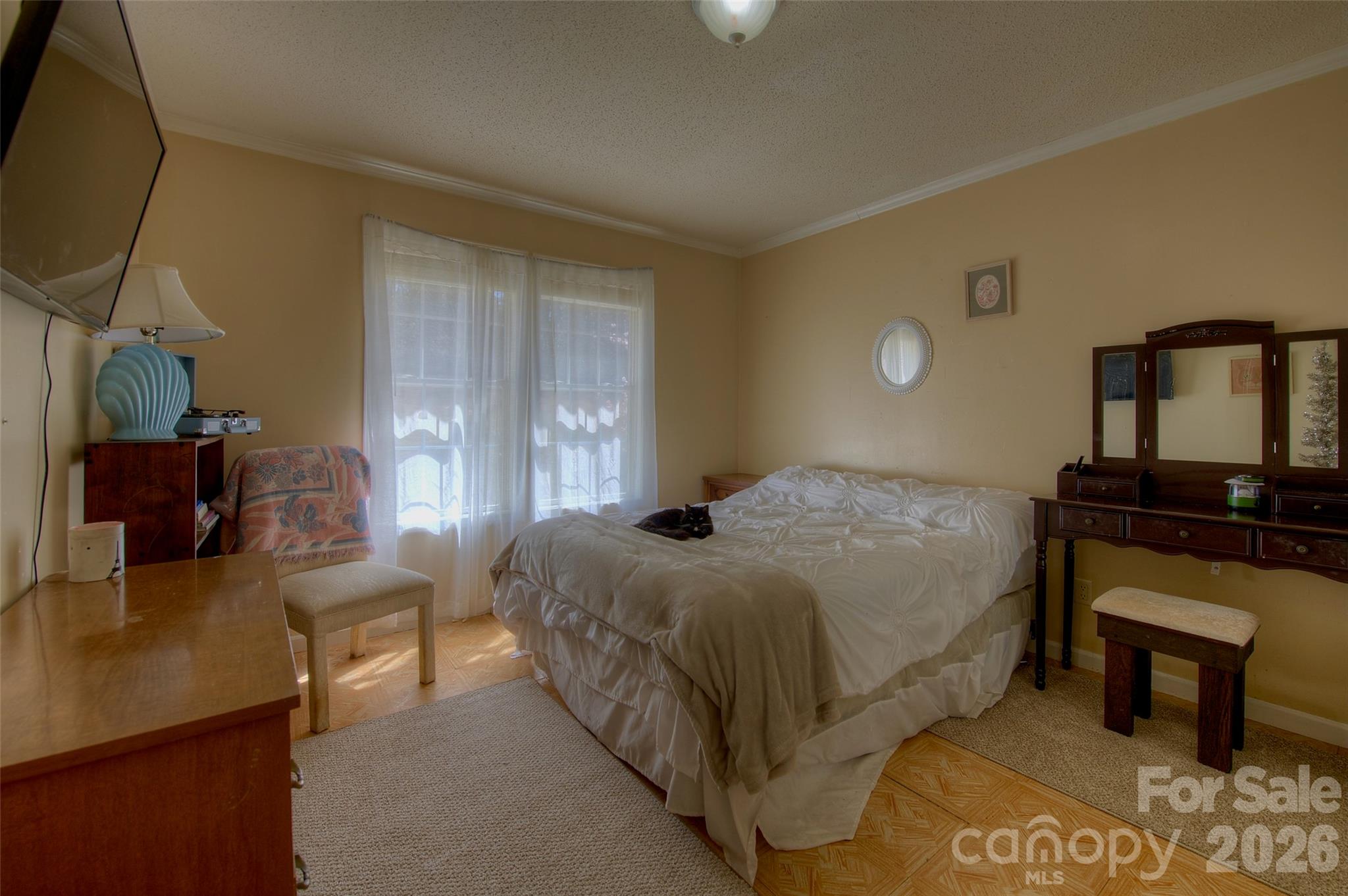 3 Altapass Trail Spruce Pine, NC 28777 - Photo 25 of 43 a bedroom with a bed and a television