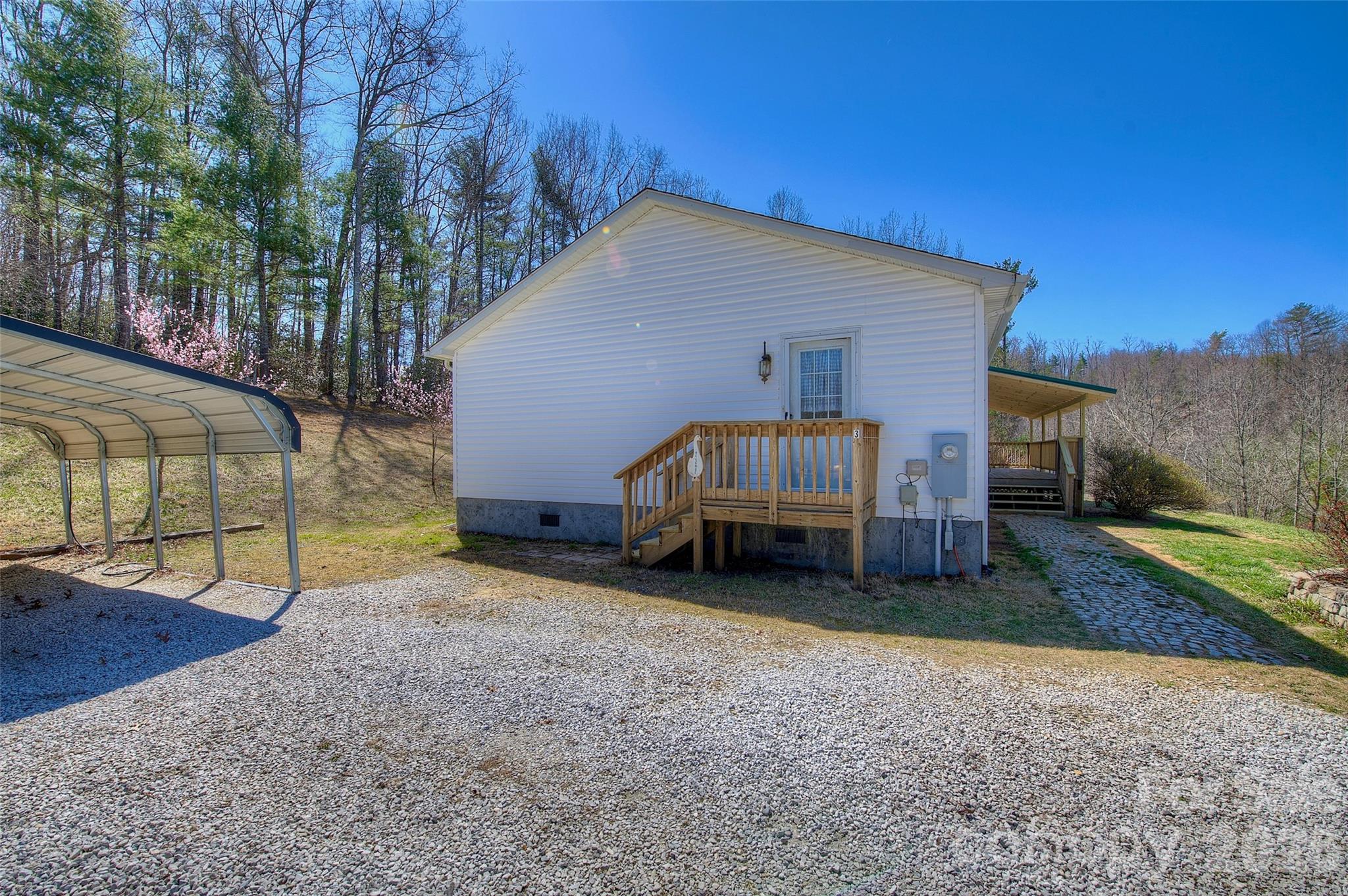 3 Altapass Trail Spruce Pine, NC 28777 - Photo 34 of 43 a view of a house with a yard