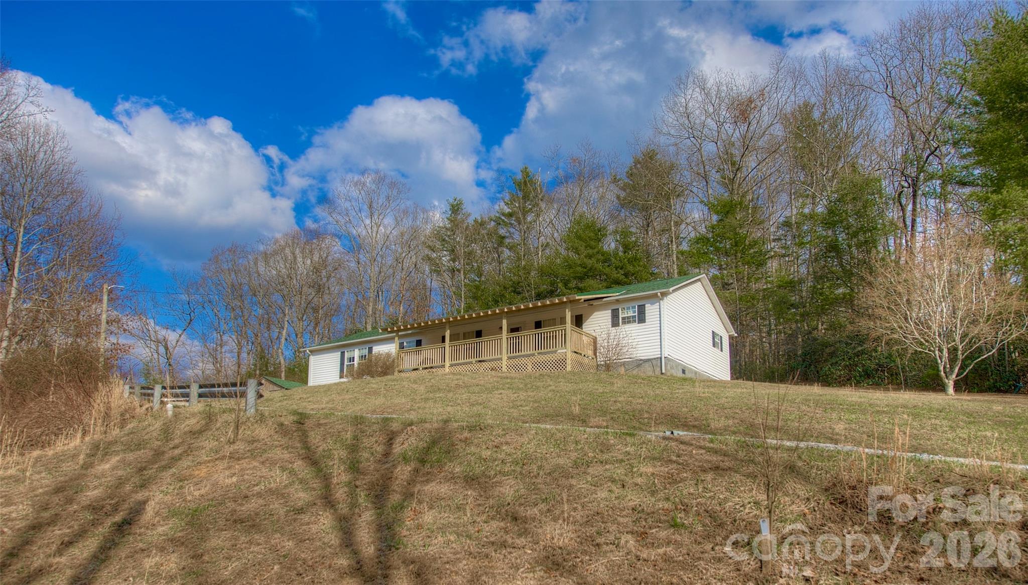 3 Altapass Trail Spruce Pine, NC 28777 - Photo 36 of 43 a view of a house with a yard