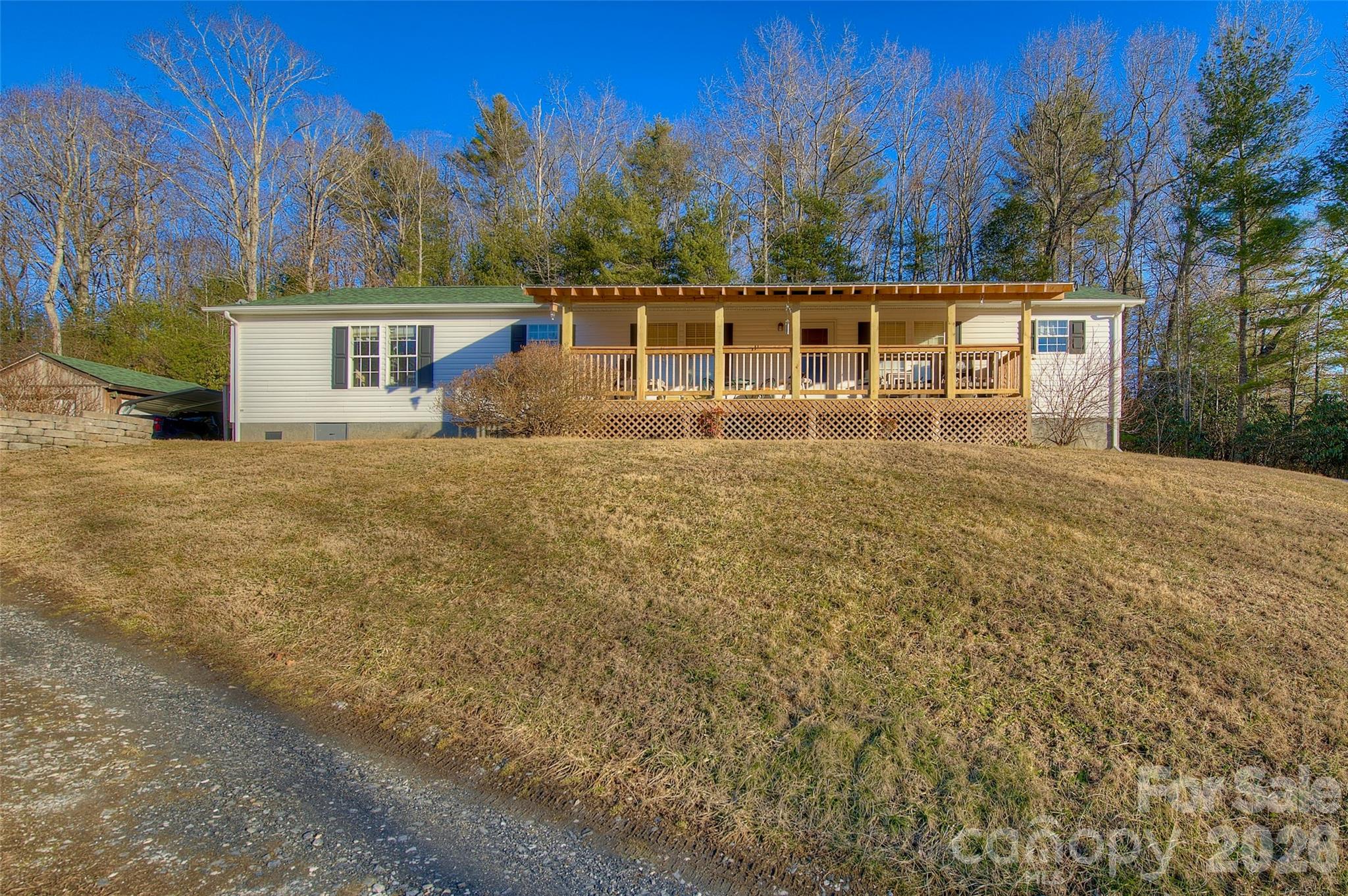 3 Altapass Trail Spruce Pine, NC 28777 - Photo 40 of 43 a front view of a house with a yard