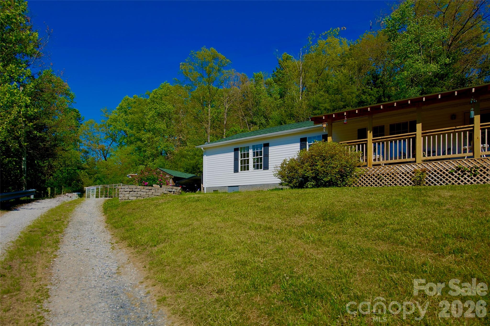 3 Altapass Trail Spruce Pine, NC 28777 - Photo 4 of 43 a view of a house with a yard