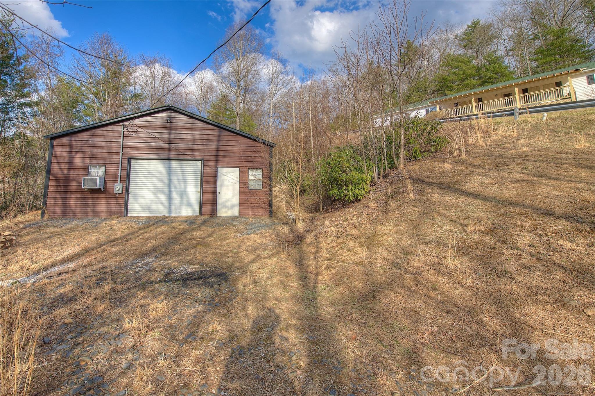 3 Altapass Trail Spruce Pine, NC 28777 - Photo 7 of 43 a front view of a house with a yard