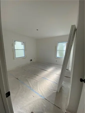 a view of hallway with closet