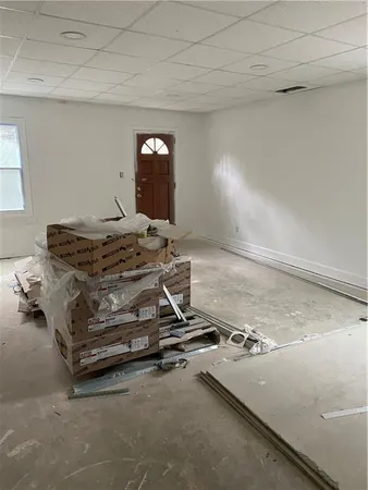 a picture of a bathroom with a window