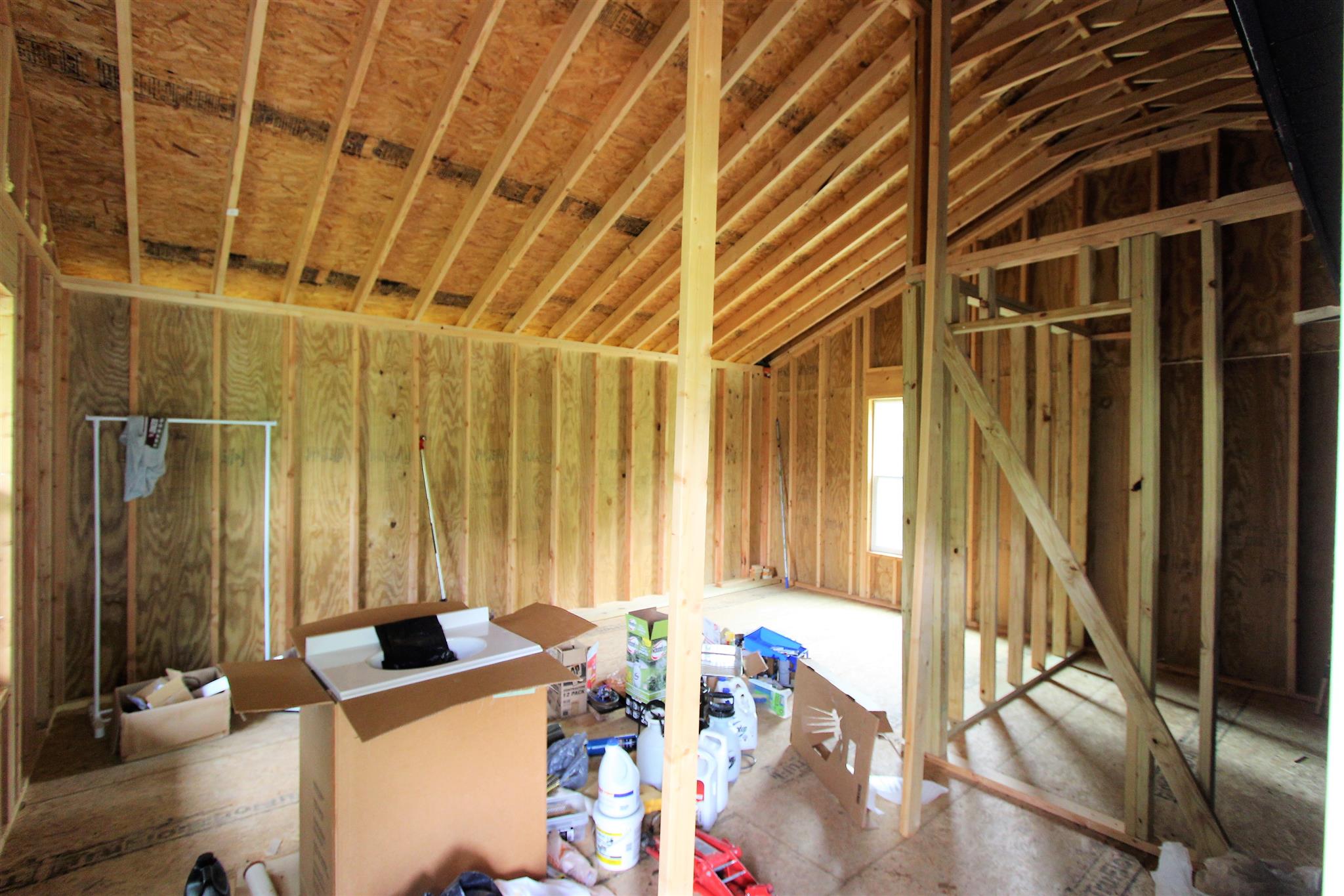 1073 Speck Road Lebanon, TN 37087 - Photo 6 of 20 a view of a dining room with furniture and floor to ceiling window