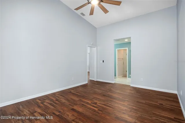 a bathroom with a sink a mirror and a vanity