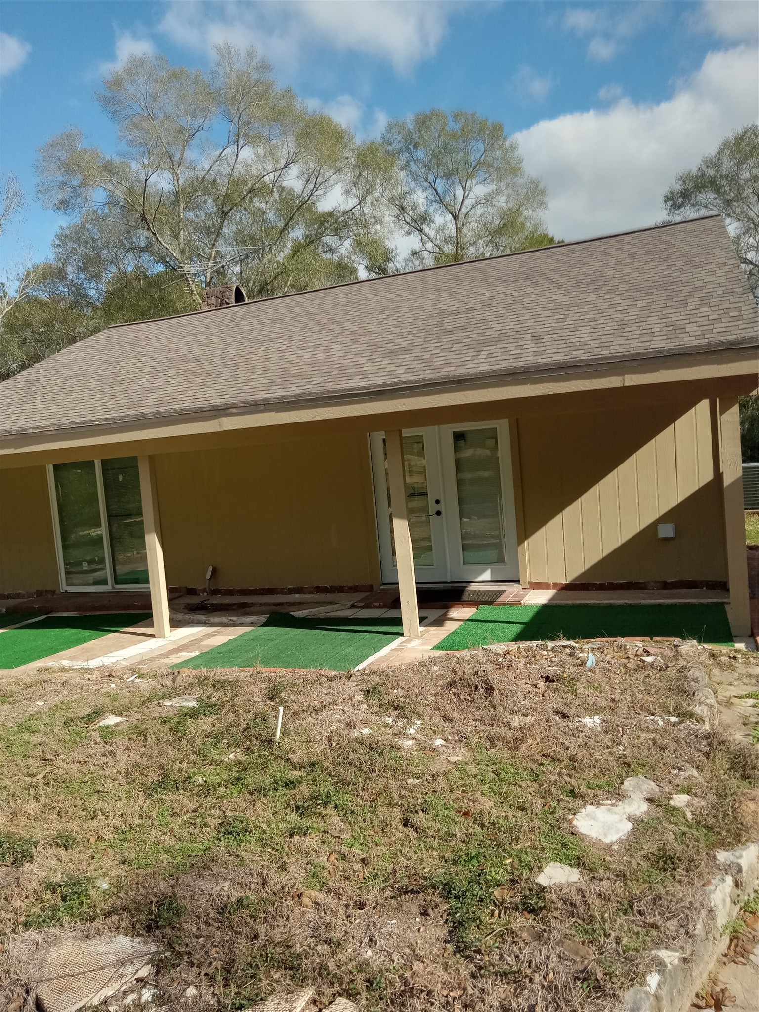 15910 Hartman Road Magnolia, TX 77355 - Photo 7 of 14 a house with a yard
