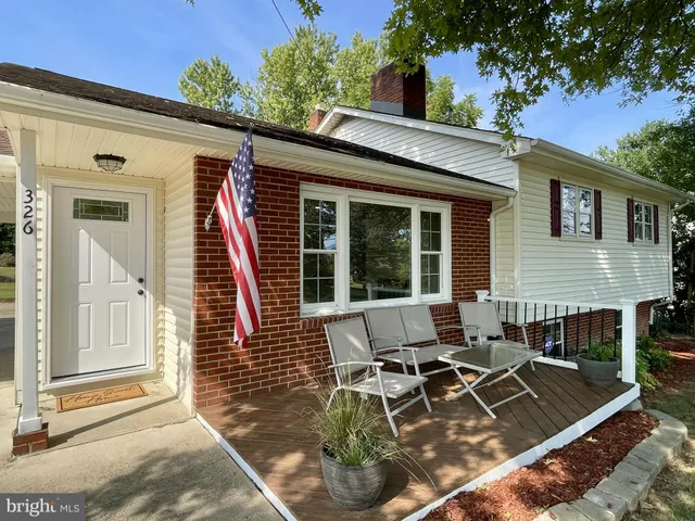 front view of a house with a patio