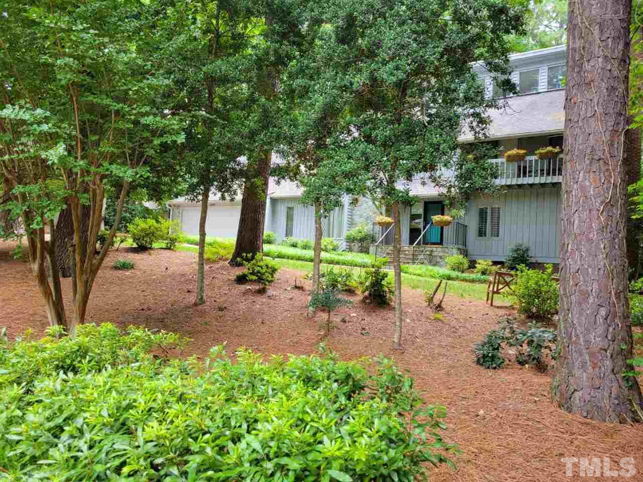 7300 Rainwater Road Raleigh, NC 27615 - Photo 1 of 18 a view of a chair and table in the garden