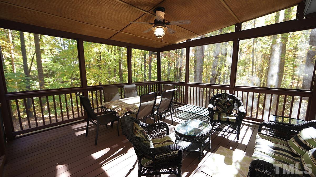 7300 Rainwater Road Raleigh, NC 27615 - Photo 15 of 18 a view of a balcony dining area with furniture