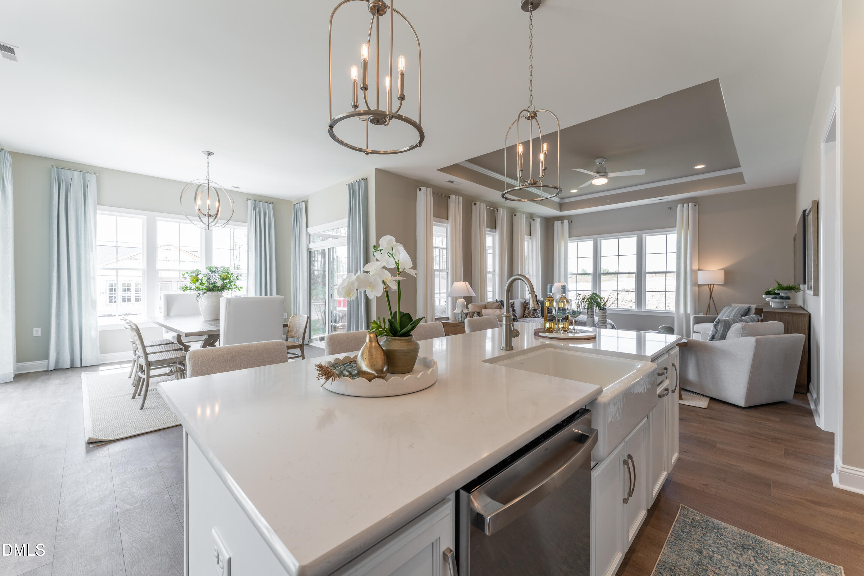 331 Oak Meadow Lane Angier, NC 27501 - Photo 12 of 32 a kitchen with a table chairs and white cabinets