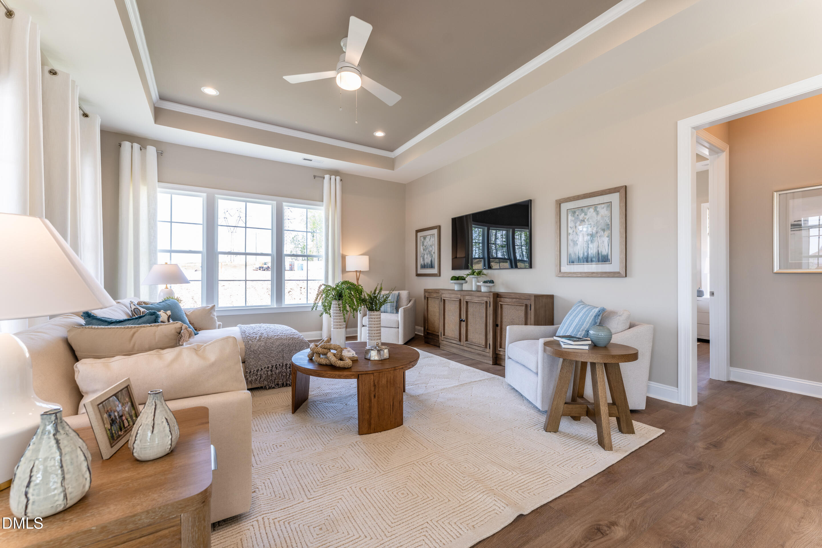 331 Oak Meadow Lane Angier, NC 27501 - Photo 14 of 32 a living room with furniture and a flat screen tv