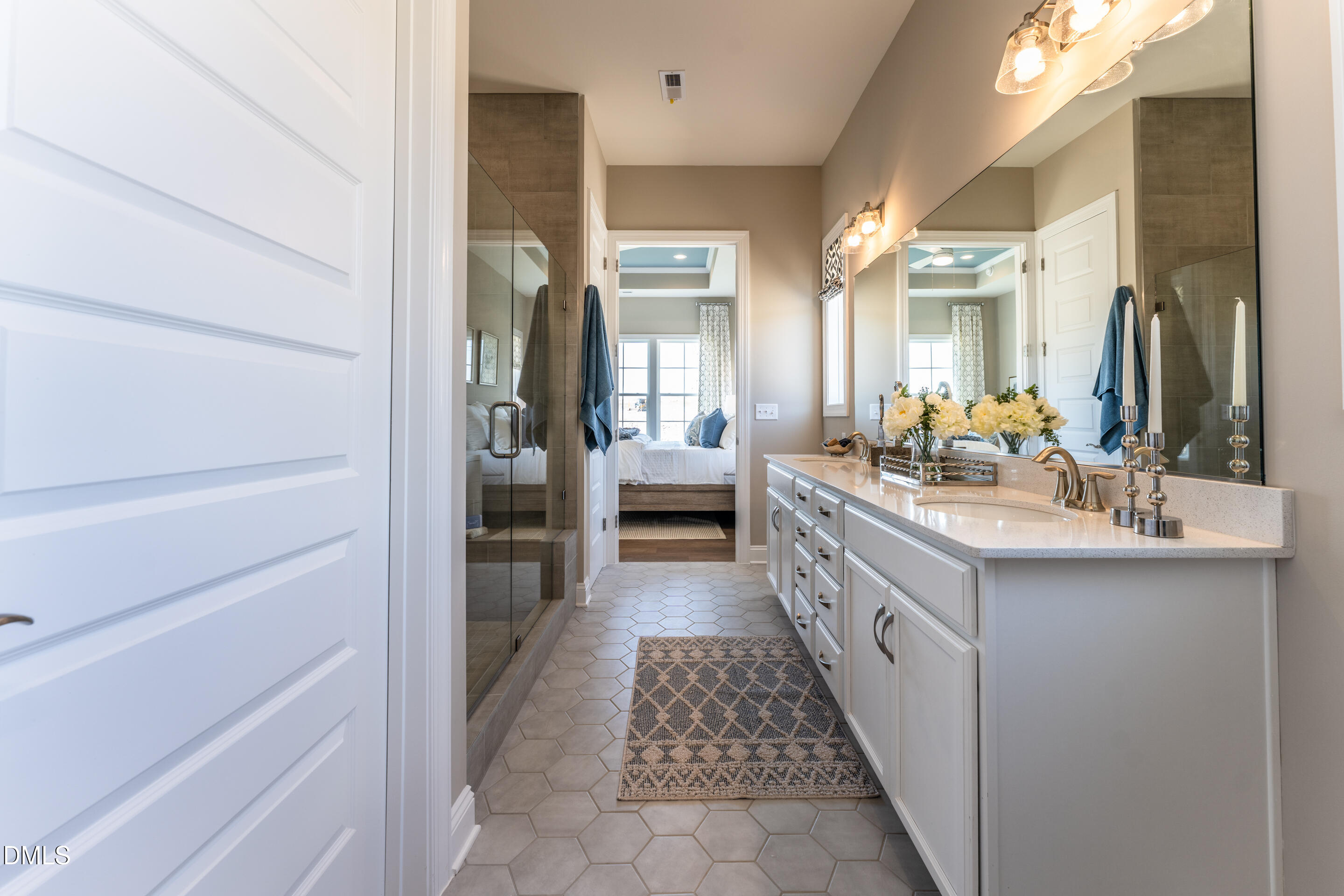 331 Oak Meadow Lane Angier, NC 27501 - Photo 19 of 32 a bathroom with a double vanity sink and a mirror