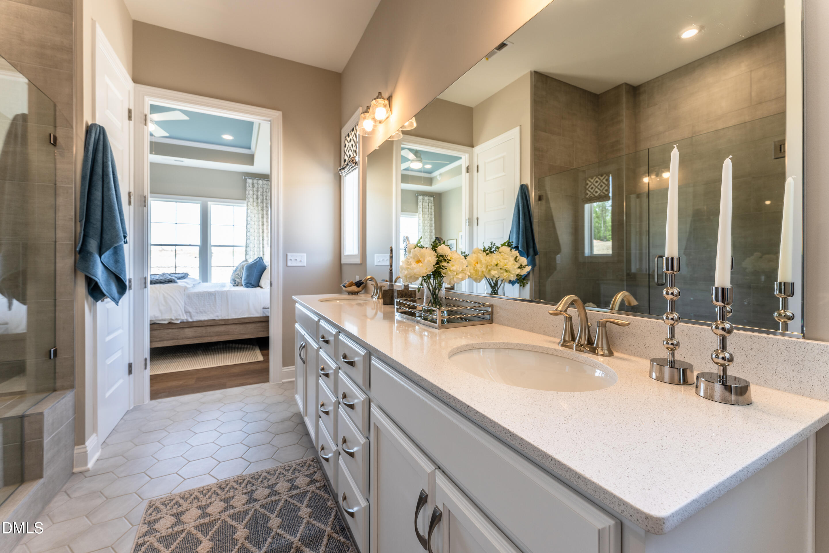 331 Oak Meadow Lane Angier, NC 27501 - Photo 20 of 32 a en suite bathroom with a double vanity sink and a mirror