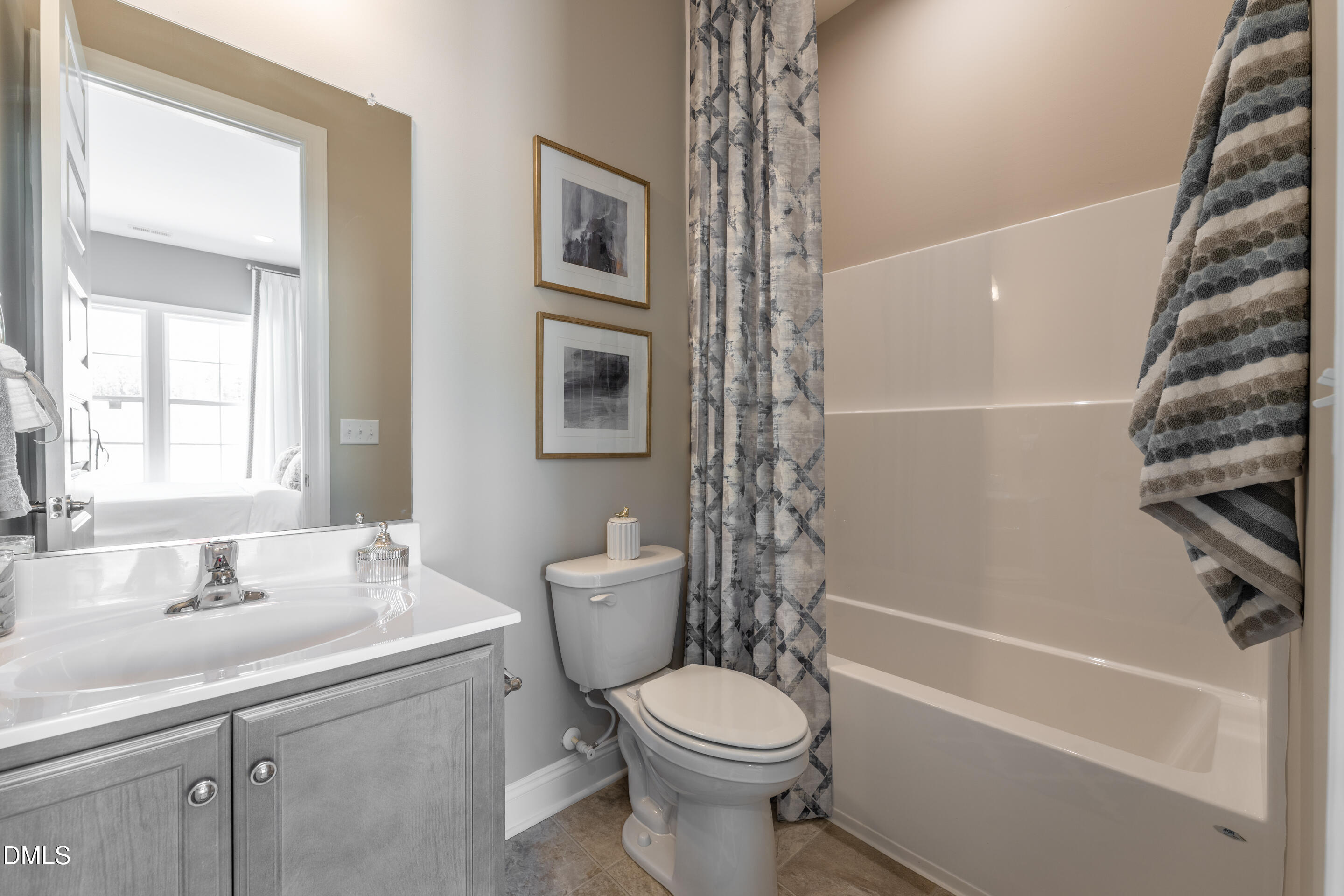 331 Oak Meadow Lane Angier, NC 27501 - Photo 25 of 32 a bathroom with a sink a toilet and shower