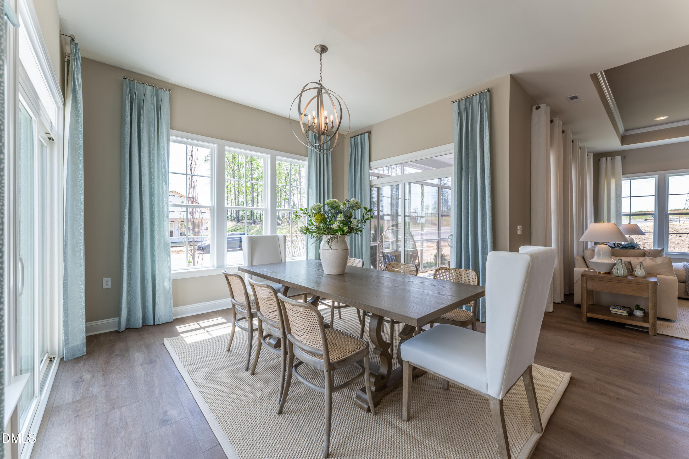 331 Oak Meadow Lane Angier, NC 27501 - Photo 8 of 32 a view of a dining room with furniture window and wooden floor